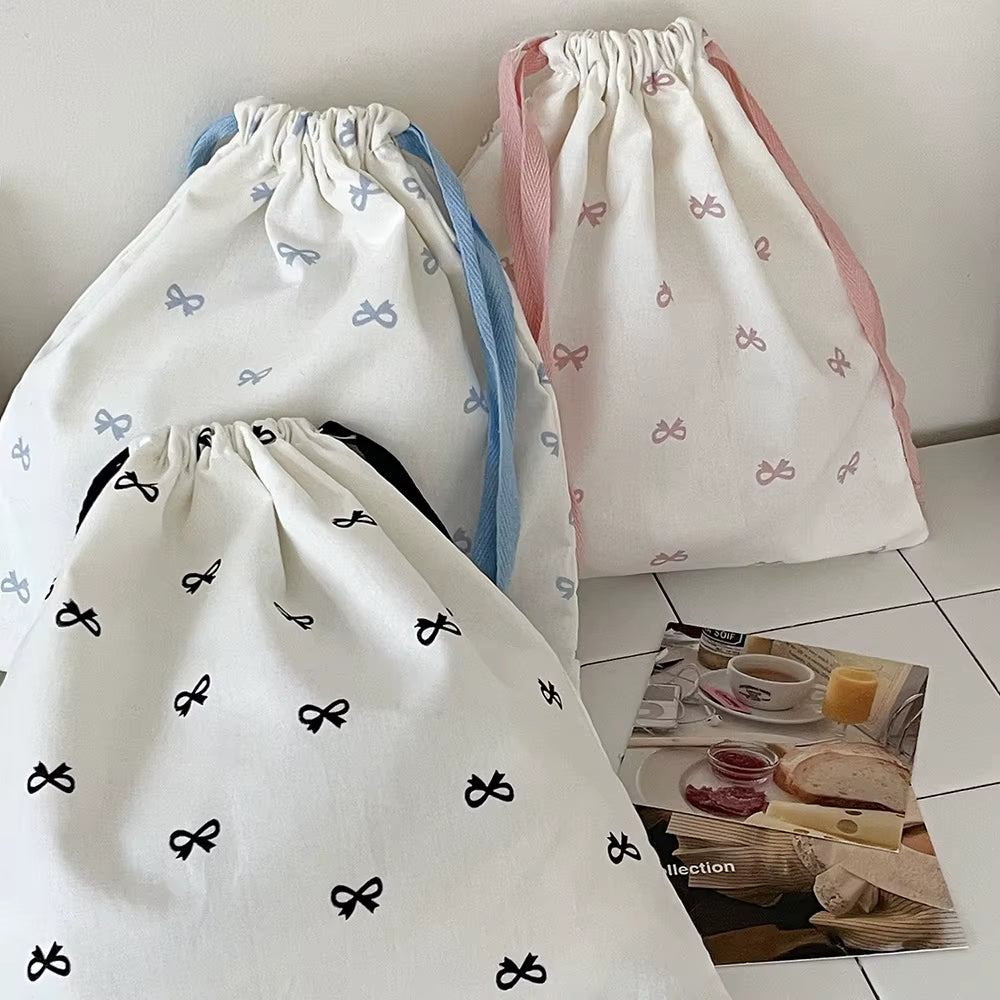 Pochette à liens et nœud — rose, bleu ou noir