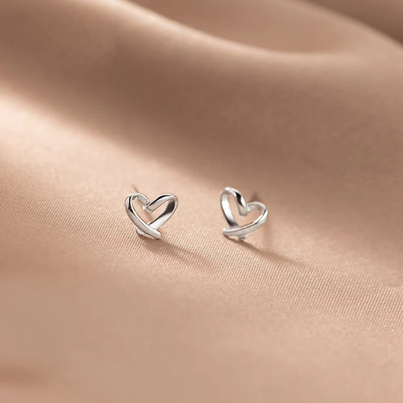 Petites boucles d’oreilles cœur ajouré