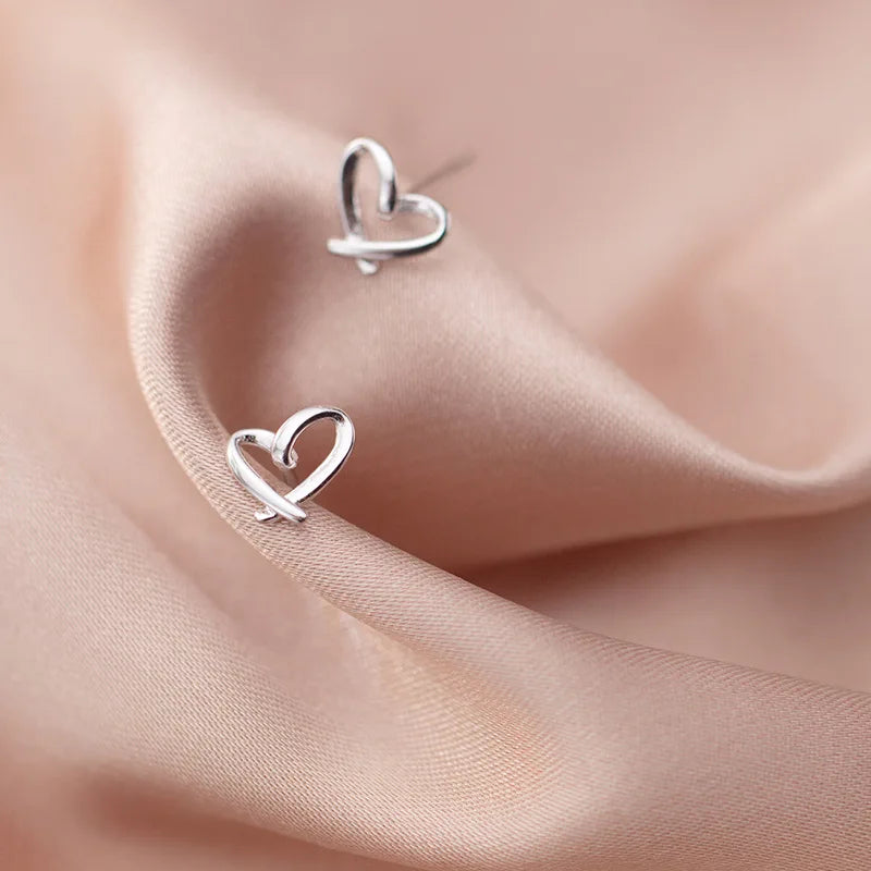 Petites boucles d’oreilles cœur ajouré