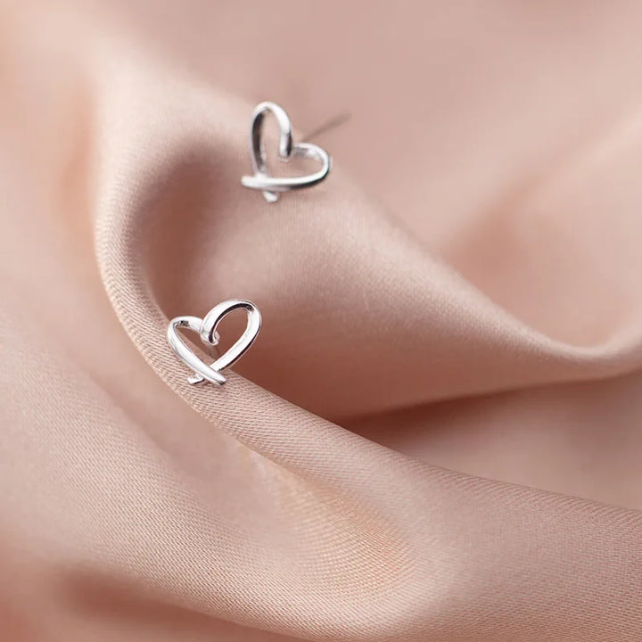 Petites boucles d’oreilles cœur ajouré