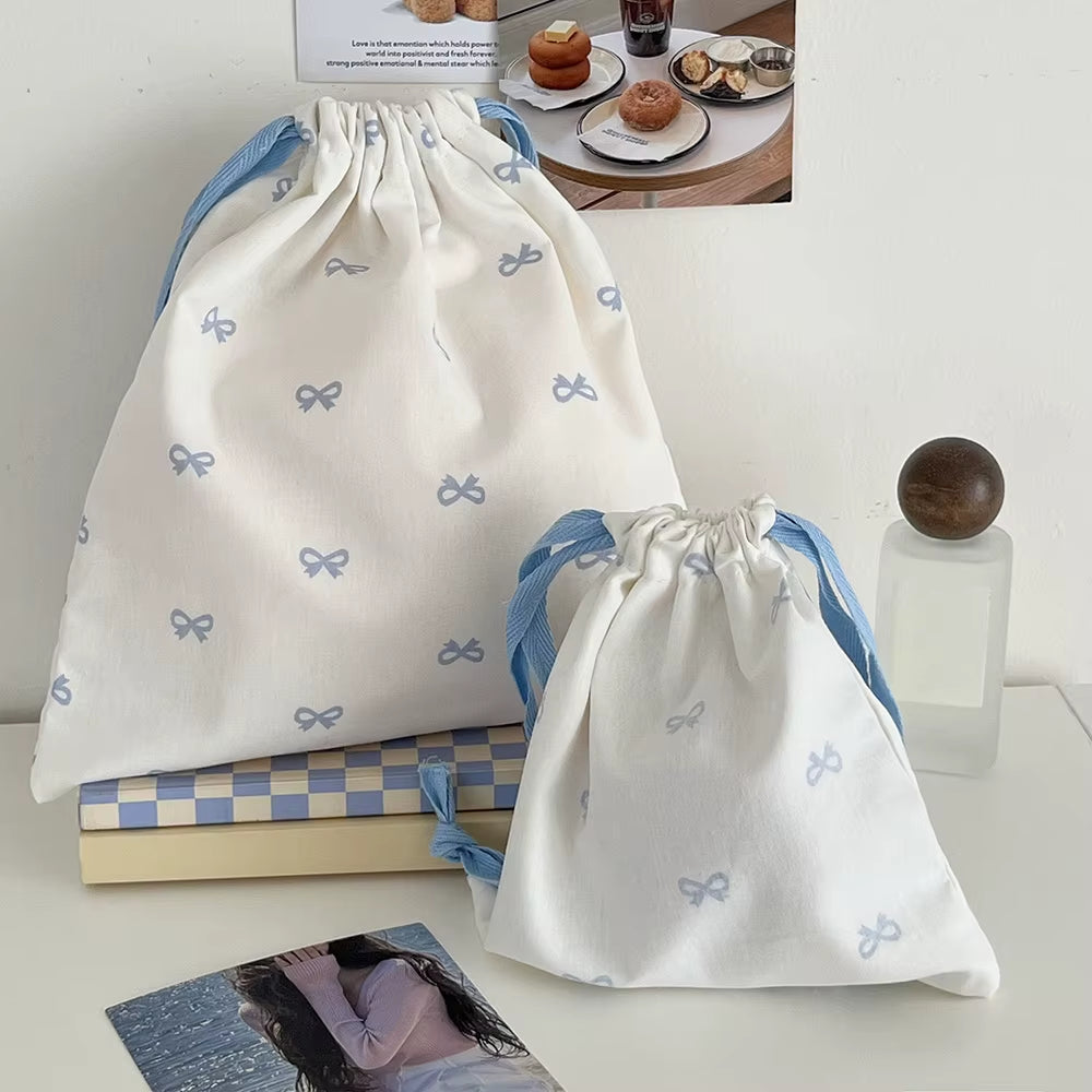 Pochette à liens et nœud — rose, bleu ou noir