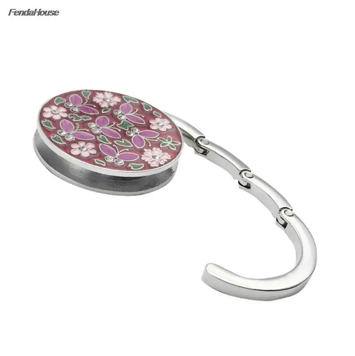 Accroche-sac de table pliable