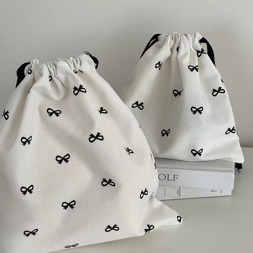 Pochette à liens et nœud — rose, bleu ou noir