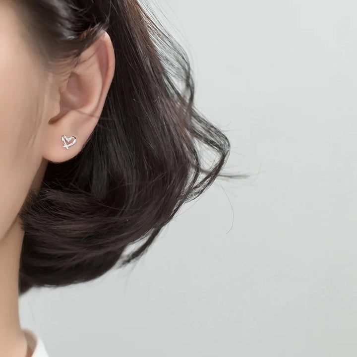 Petites boucles d’oreilles cœur ajouré