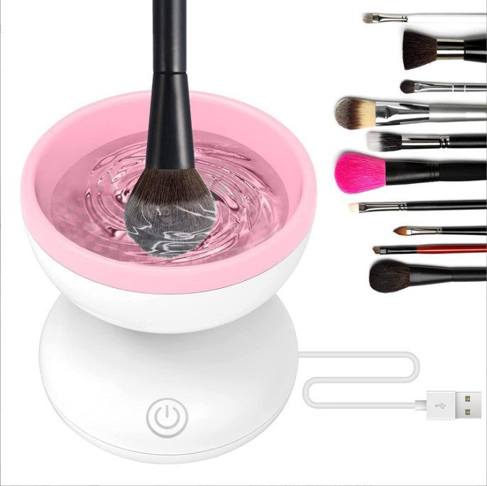 CleanSpin blanc et rose — nettoyeur électrique. Pinceaux illustrés non inclus.