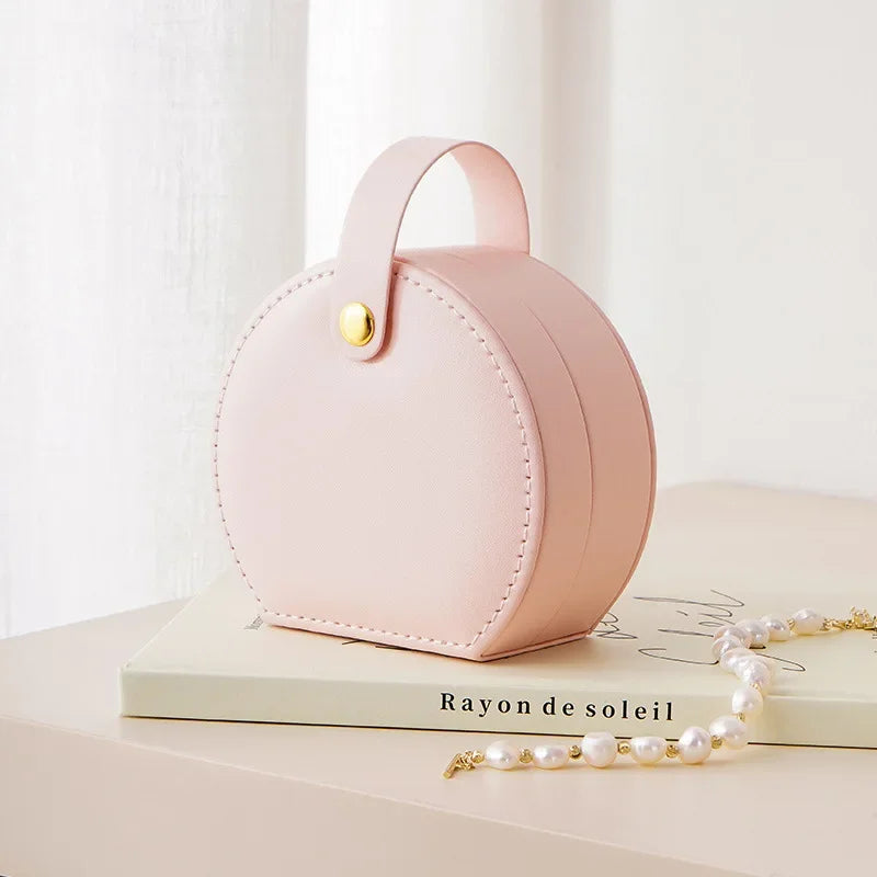 Écrin à bijoux de voyage arrondi