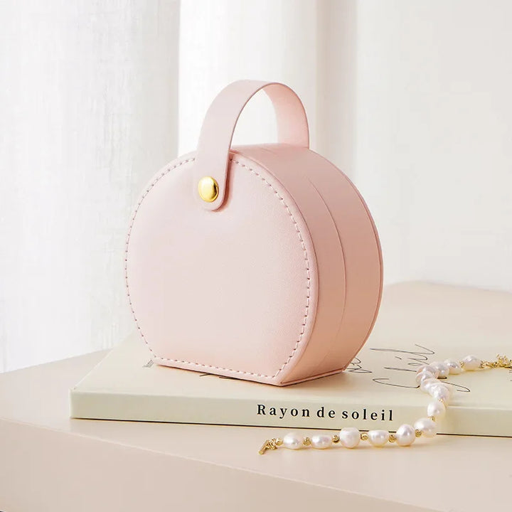 Écrin à bijoux de voyage arrondi