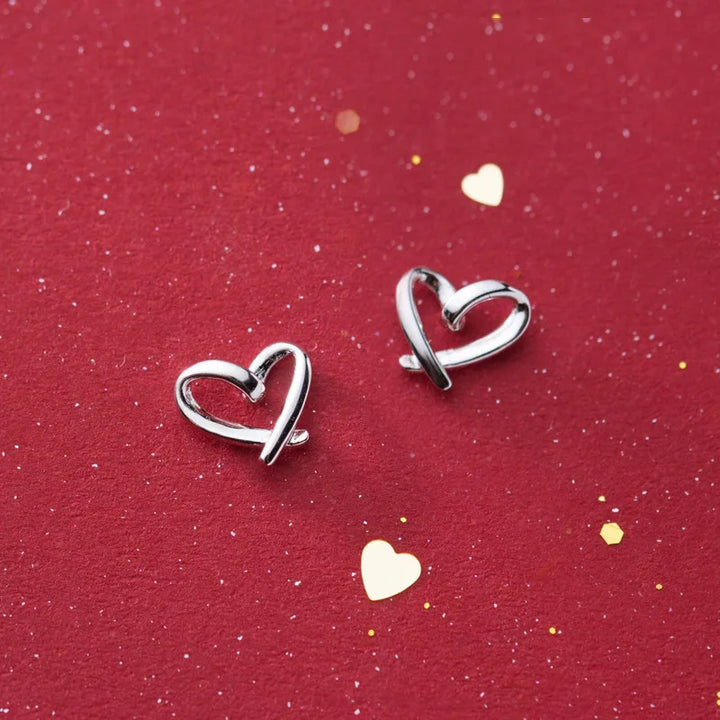 Petites boucles d’oreilles cœur ajouré