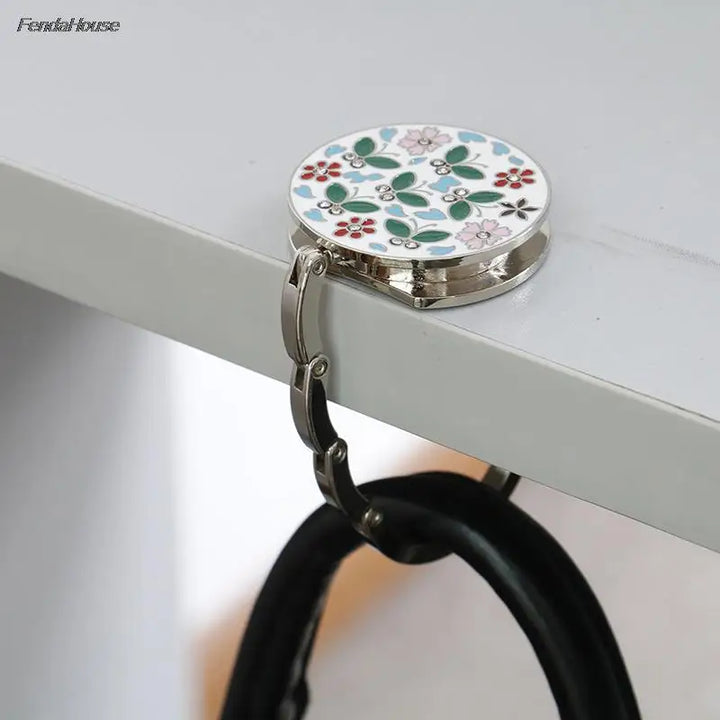 Accroche-sac de table pliable